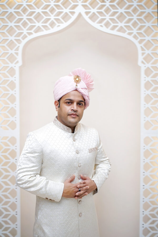 Elegant White Sherwani with Handcrafted Zardozi work