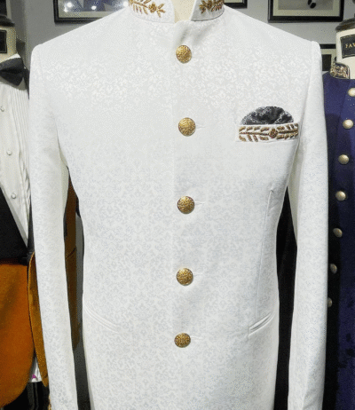 Elegant White Jodhpuri Suit adorned with intricate Zardosi Handwork.